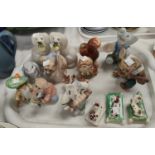 A selection of decorative ceramic animals; a large Beswick Elephant (a.f); Beswick Squirrel gold