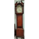 An early 19th century oak and mahogany longcase clock, with swan neck pediment and reeded side