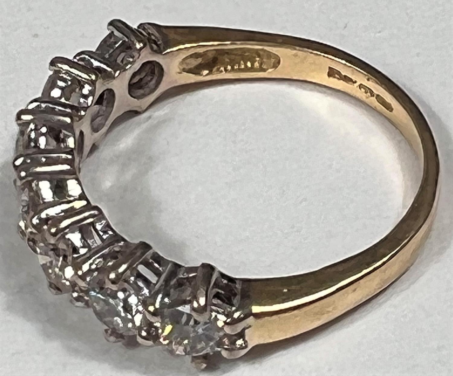 An 18 carat hallmarked gold half eternity ring set 7 diamonds, 3.5mm diameter of stones approx - Image 7 of 7