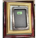 A hallmarked silver rectangular photo frame, Birmingham 1913; other photo frames