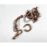 A watch chain stamped 18ct. 4.8gm; other gold plated clips etc