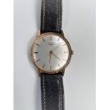 A 1970's Longines Gent's wristwatch with baton markers, hand winding movement, on later leather
