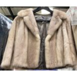 A blonde mink jacket