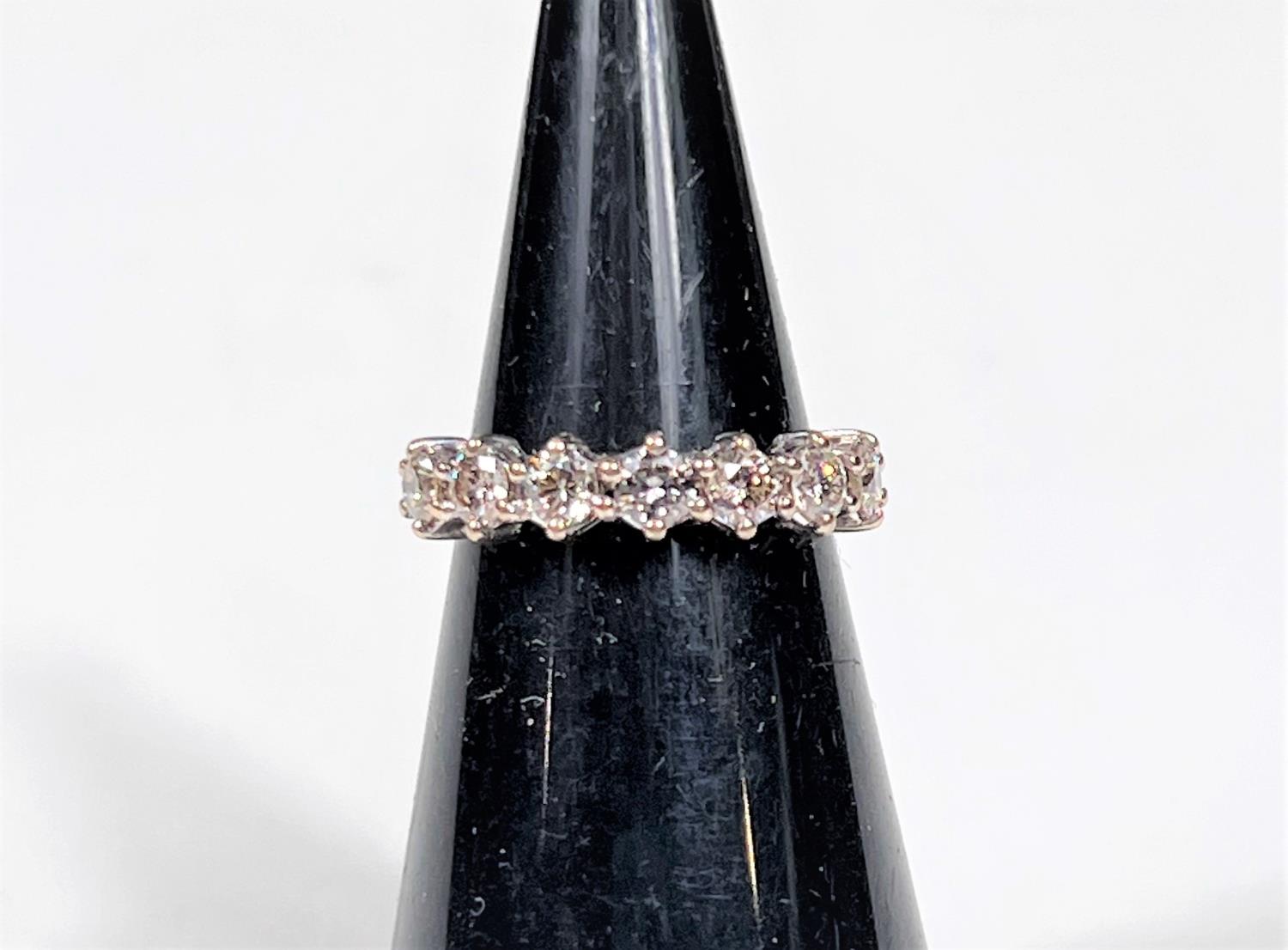 An 18 carat hallmarked gold half eternity ring set 7 diamonds, 3.5mm diameter of stones approx - Image 4 of 7