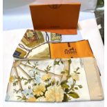 Two Hermes silk headscarves with original packaging and bag