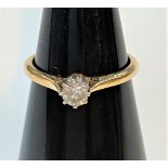 A yellow metal dress ring set diamond solitaire, stamped '18ct plat', stone 4mm diameter approx, 0.2