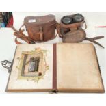 A WWI pair of Stereo Prism binoculars by Ross, in original leather case; a similar pair; a Victorian