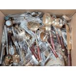 A large selection of brass and other cutlery.
