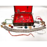 A wooden jewellery box with a selection of costume and other various jewellery.