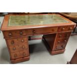 A mahogany pedestal desk with three drawers to each pillar and under desk, with leather top (