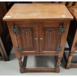 An oak old charm small double door cabinet a Lloyd Loom style chair