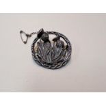 A hallmarked silver Scottish thistle brooch with Edinburgh marks, maker's mark rubbed. 13.5gms.