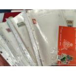 A selection of world stamps on sheets and loose with first day covers etc