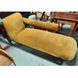 An Edwardian walnut chaise longue with incised decoration, turned legs and gold dralon upholstery
