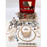 A selection of costume jewellery in jewellery box including pearl necklaces, diamante, beads etc