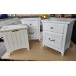 Two pairs of white bedside cabinets.