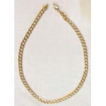 A 9ct gold yellow metal flat curb chain 47.4gms, length 51cm