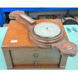 An oak canteen box including various cutlery and an oak banjo aneroid barometer