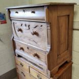 An unusual shaped pine chest of three drawers, with panelled decoration, 96 x 52cm