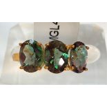 A 9 carat white gold dress ring set 3 oval Kelayi opals, total opal weight 2.73 carats, size N/O;