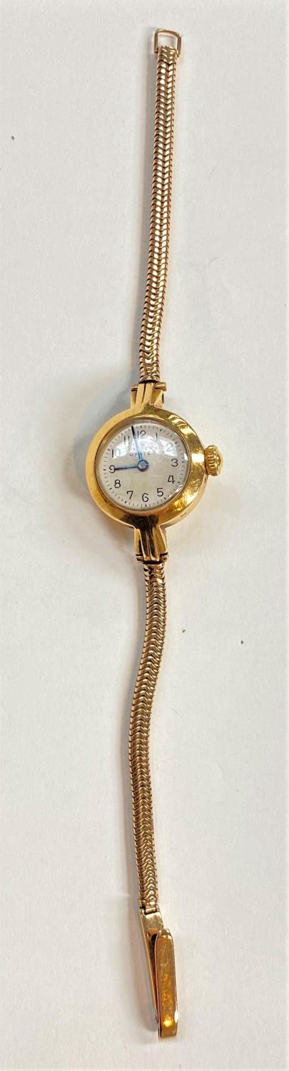 A Rolex yellow metal wristwatch on articulated yellow metal strap, stamped '9ct', gross weight 22.