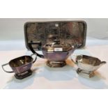 An Art Deco style canted rectangular 3 piece hallmarked silver tea set Sheffield 1975, 35oz; a