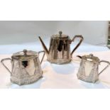 A 3 piece 19th century silver plated tea service with embossed decoration