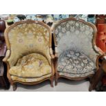 A pair of early/mid 20th century Louis XV style walnut armchairs with carved crests and cabriole