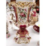 A 19th century French Paris vase with scrolling decoration highlighted in gilt flowers, height 35.