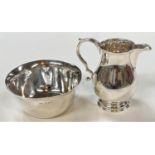 A hallmarked silver baluster cream jug, London 1959; a plain sugar bowl, Edinburgh 1937, 7.25oz