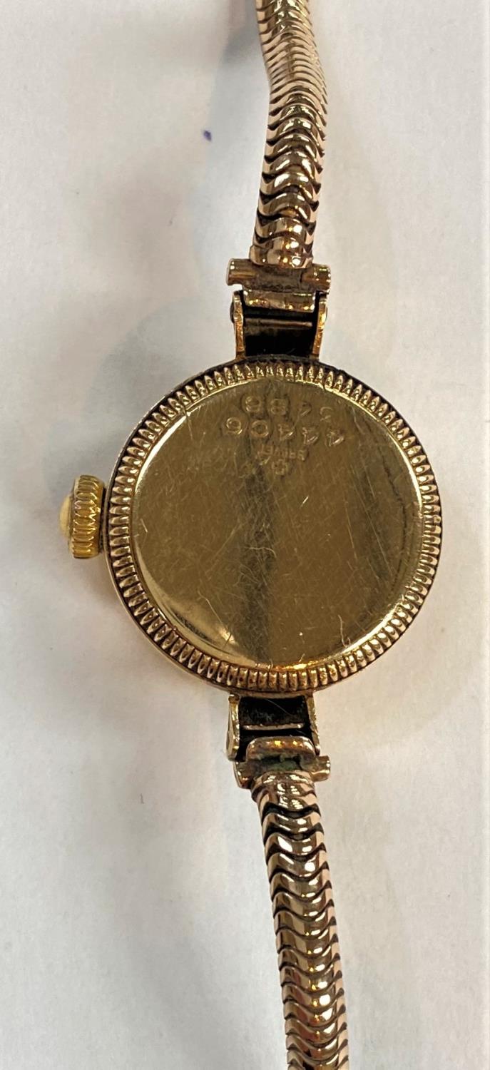 A Rolex yellow metal wristwatch on articulated yellow metal strap, stamped '9ct', gross weight 22. - Image 3 of 3