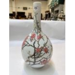 A Chinese bulbous vase with slender neck, decorated with polychrome flowering branches, poss.