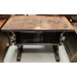A refectory style rustic occasional table in oak