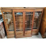 An oak breakfront bookcase with four astragal glazed doors, length 82 x height 53cm