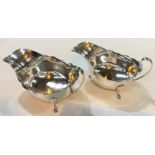 A pair of sauce boats with cut rims and triple feet, Birmingham 1933, 5.5oz