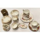 A large pair of Royal Albert Country Roses cups & saucers; a similar pair of Derby Posies and an