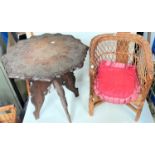 An oriental octagonal carved hardwood occasional table; a child's cane armchair