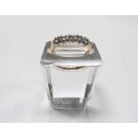 An 18 carat hallmarked gold ring set with 5 diamonds, approximately 3mm, 3 gm gross, size Q