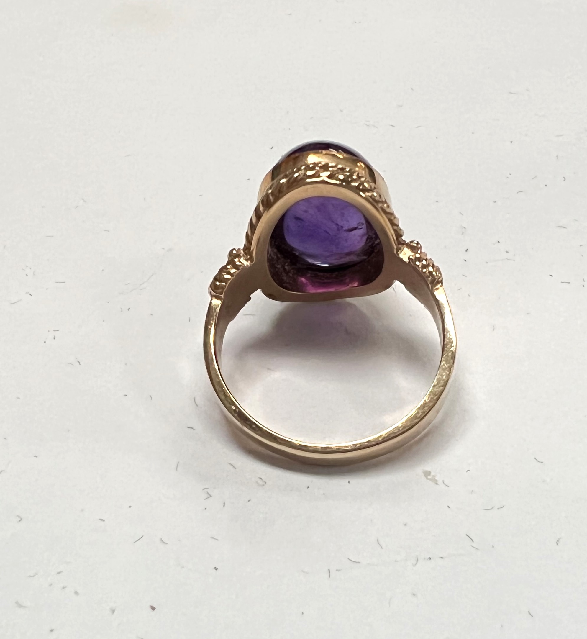 A Victorian style 9 carat hallmarked gold ring set with a large carbuncle amethyst colour stone, 4. - Image 2 of 2