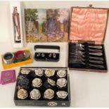 A set of Dunlop 65 golf balls in original box and wrapping; cake forks; napkin rings; etc.
