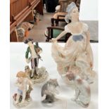 A late Meissen figure: man in 18th century dress with bagpipes and sheep, crossed swords mark; a