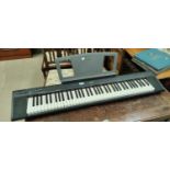 A Yamaha electric keyboard 'Portable Grand' NP30