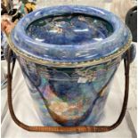 An early 20th century 'Byzanta ware' by Grimwades Primrose purple lustre slop bucket with woven