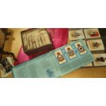 A good selection of cigarette cards, including loose part sets and albums including transport,