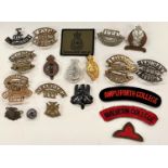 A selection of Officer's military cadet badges etc