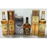 Two boxed bottles of vintage Bells Old Scotch Whiskey, extra special one gilt box and a bottle of 12