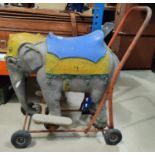 A vintage push along tri-ang elephant