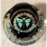 A modern paperweight, limited edition by William Manson with suspended butterfly and millefiori,