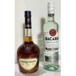 A 70cl bottle of Courvoisier Cognac, 40% vol; a 70cl bottle of Bacardi Carta Blanco rum, 37.5% vol