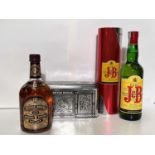 A J & B Rare Blend of Scotch whisky in tin tube; a 70cl  bottle of 12 year old Chivas Regal Scotch